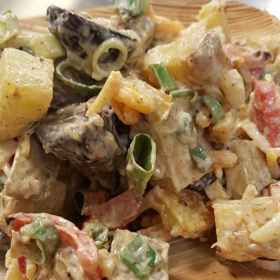 Cajun potato salad catering bowl made with roasted Ontario potatoes, house-made dressing, fresh vegetables and cheese — Radical Gardens, Timmins