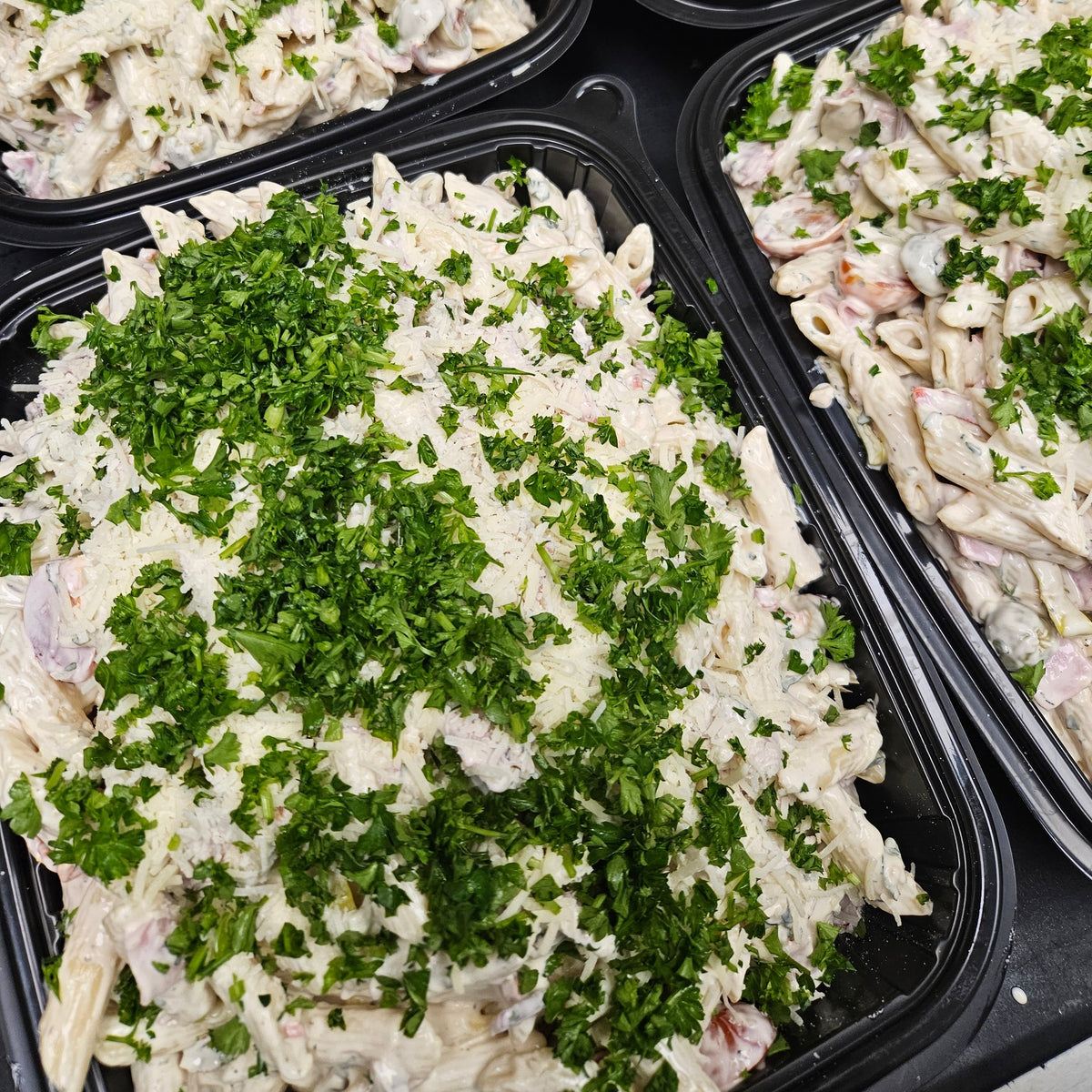 Scratch-made pasta salad catering bowl with house-made dressing and fresh seasonal vegetables — Radical Gardens